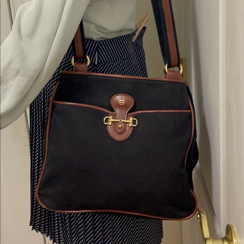 Etienne Alinger's beautiful black and brown Convers and leather bag